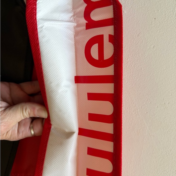 Lululemon shopping bags. Red, Black, and White Tote Bags - Picture 5 of 5